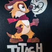 Titash paper cut badge